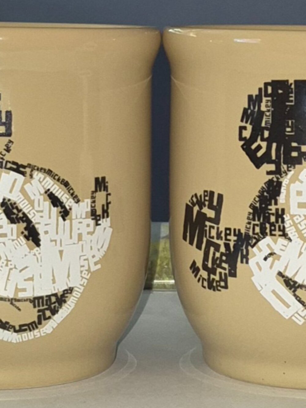 Set of 2 Disney Store Mickey Mouse Text Art Coffee Tea Beverage Mug Cup Tan NEW